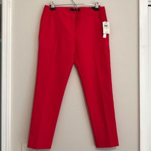 Brand new elegant ankle length pants in red.
